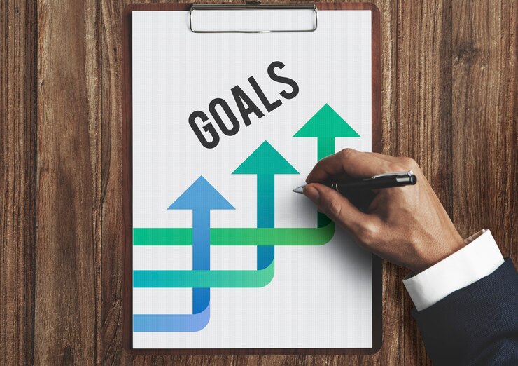 A colorful sign with the word goals written on it.